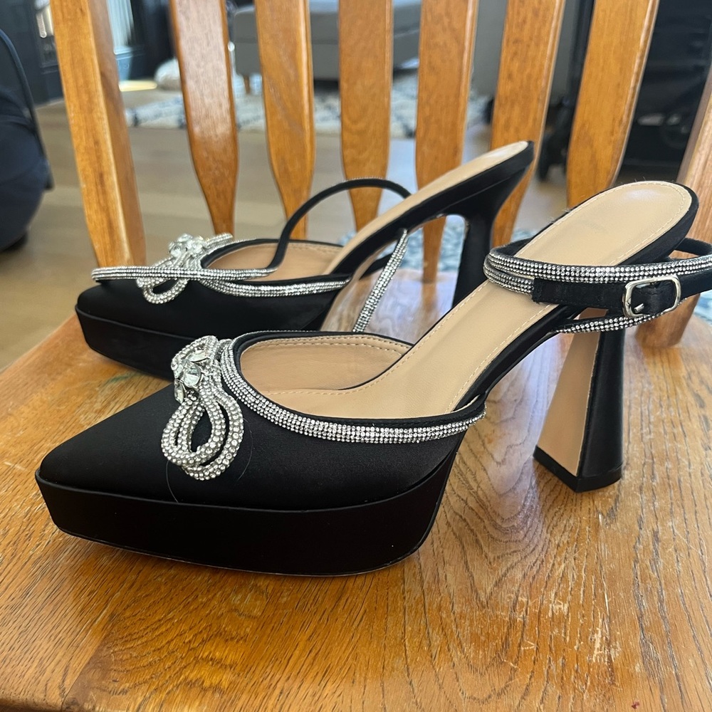 Women’s heels with rhinestone bow and ankle straps
